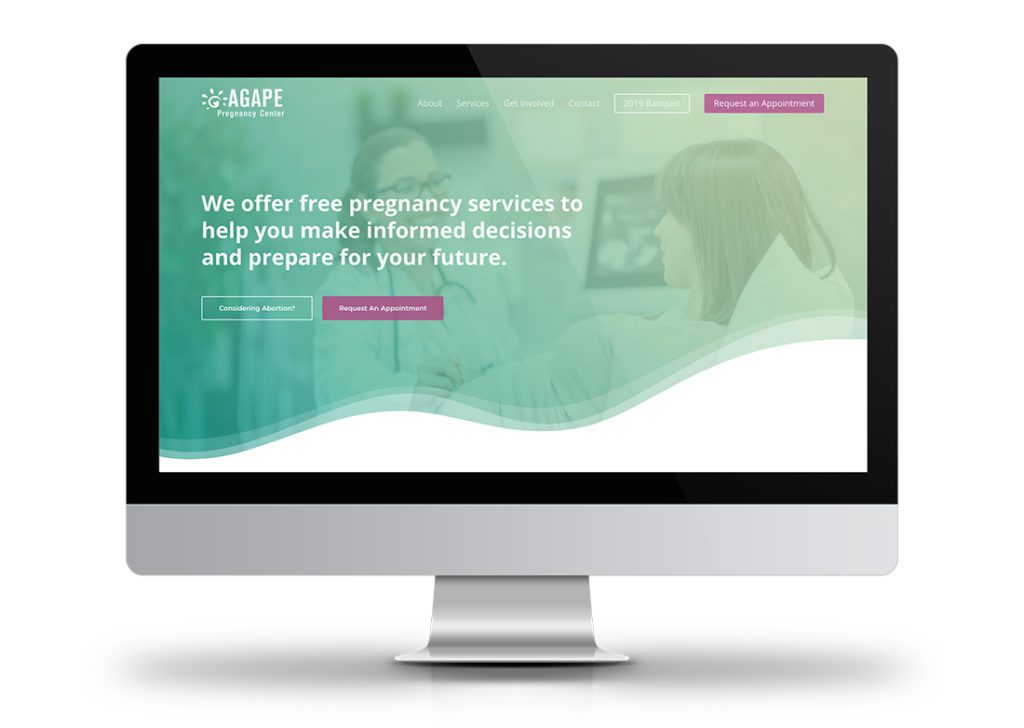 Agape Pregnancy Center website homepage on computer