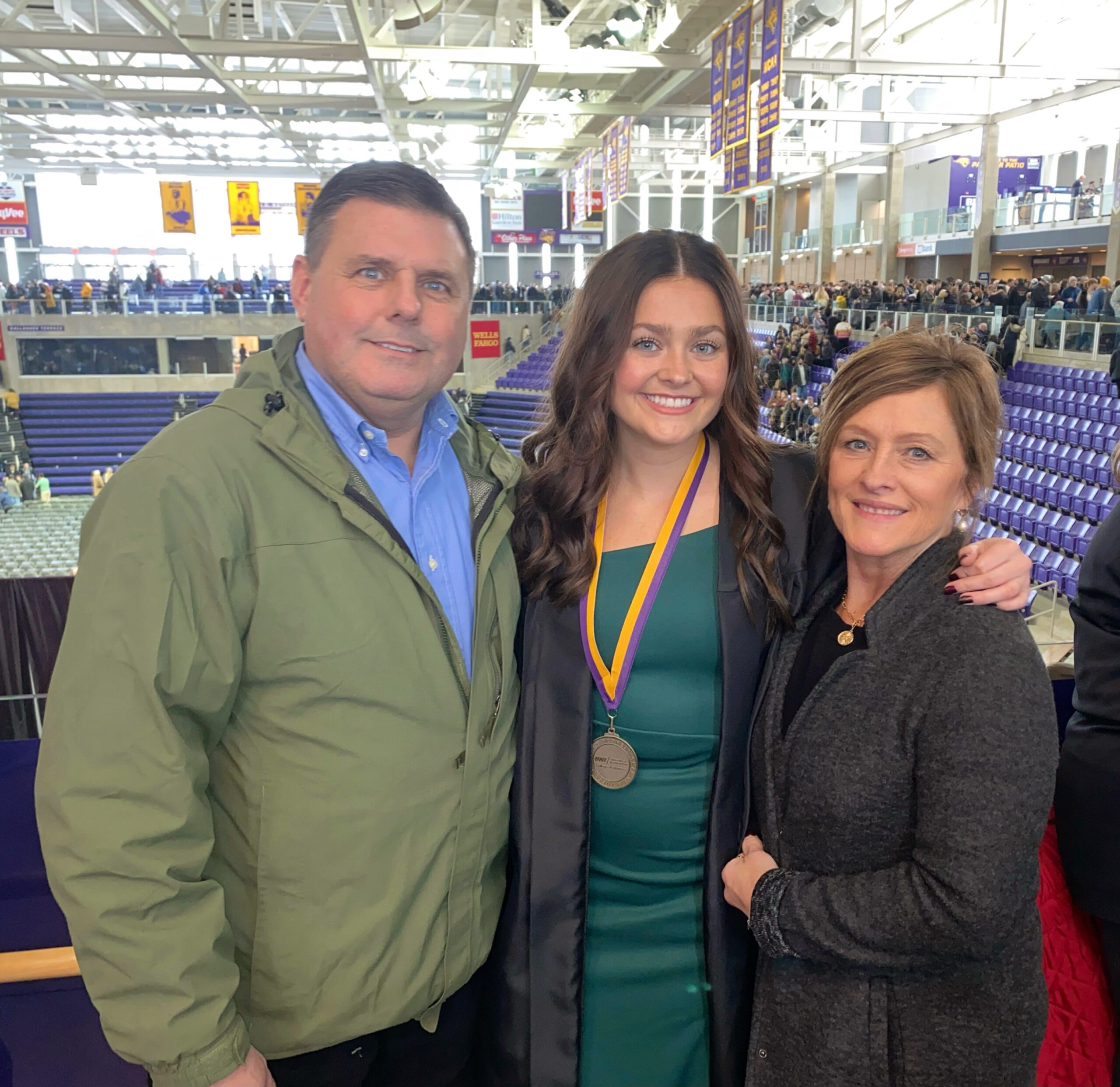 Erin Carew with family at University of Northern Iowa graduation celebration