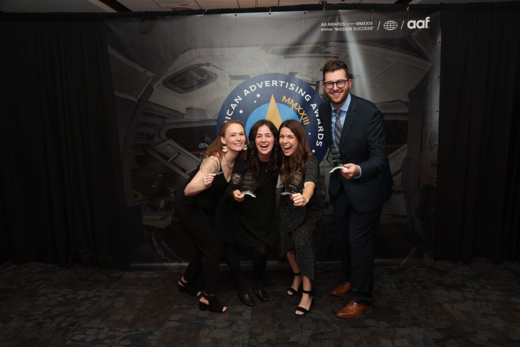 IMG_7941 TwoTone Creative team celebrating advertising awards and client success.