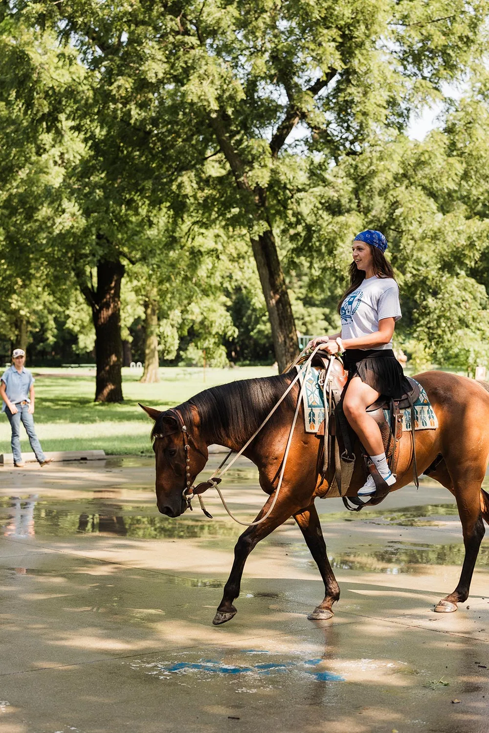 Woman on horseback illustrating remarkable people and team traditions at TwoTone Creative.
