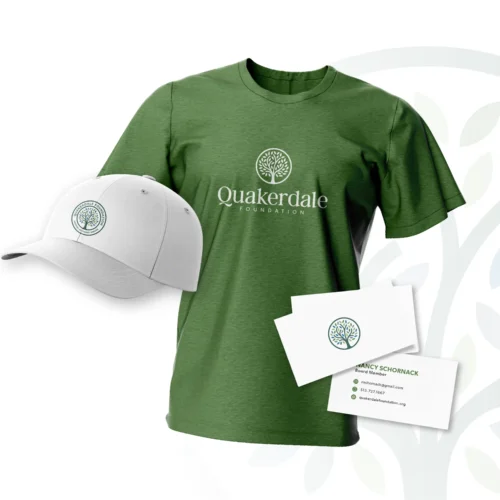 Quakerdale Foundation branding mockup with t-shirt, hat, and business cards showcasing brand identity system.