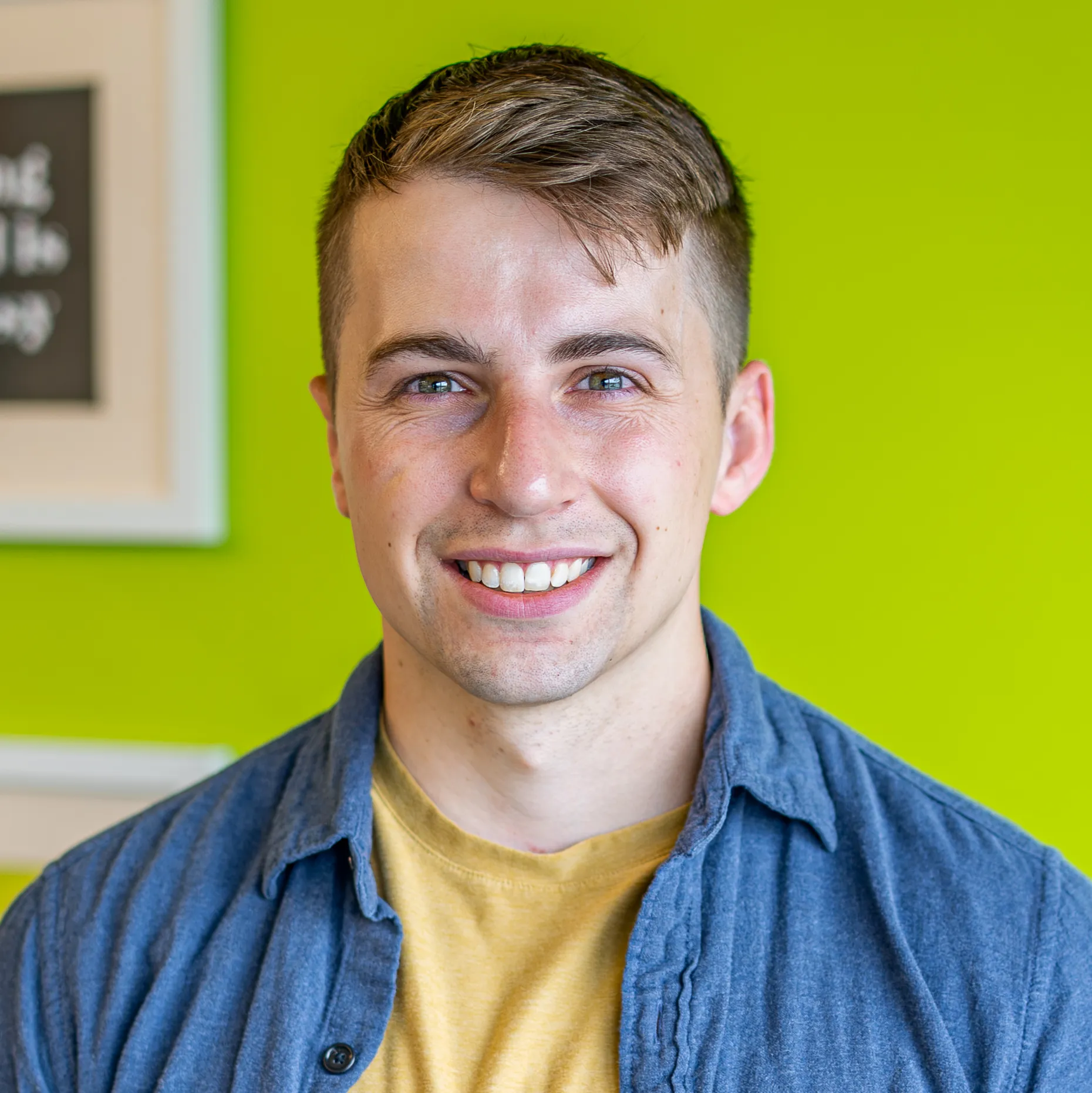 Matt Carlson, graphic designer at TwoTone Creative, smiling portrait