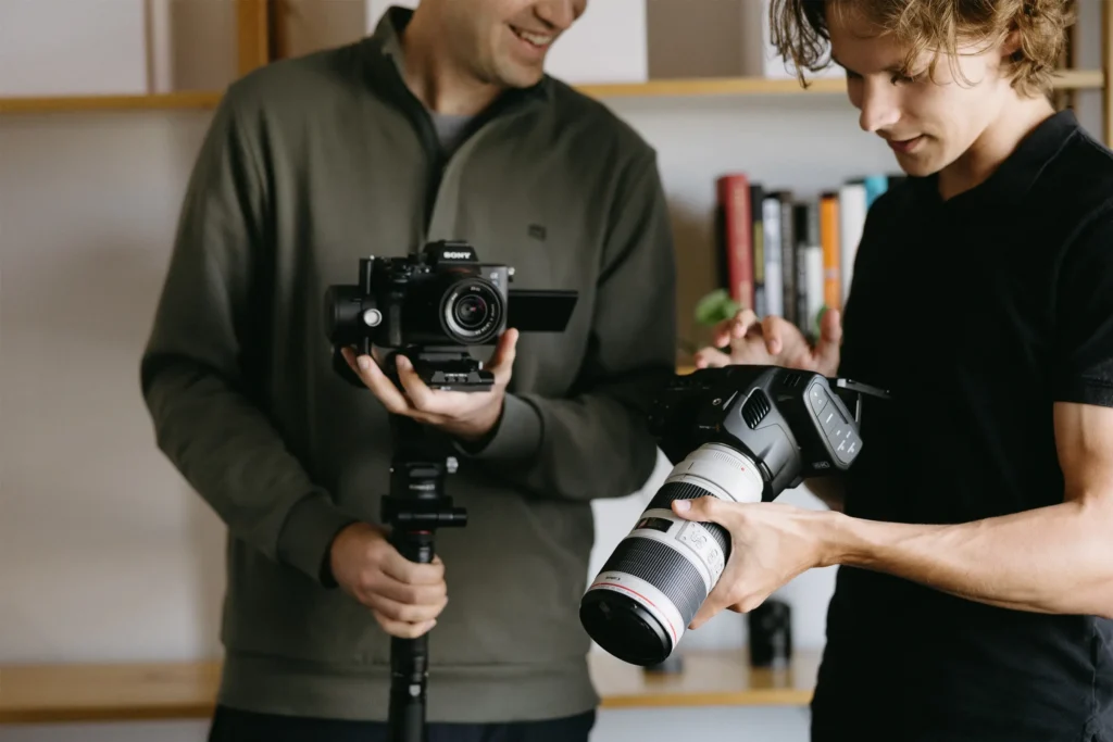 TwoTone Creative videographer and video editor working with camera equipment.