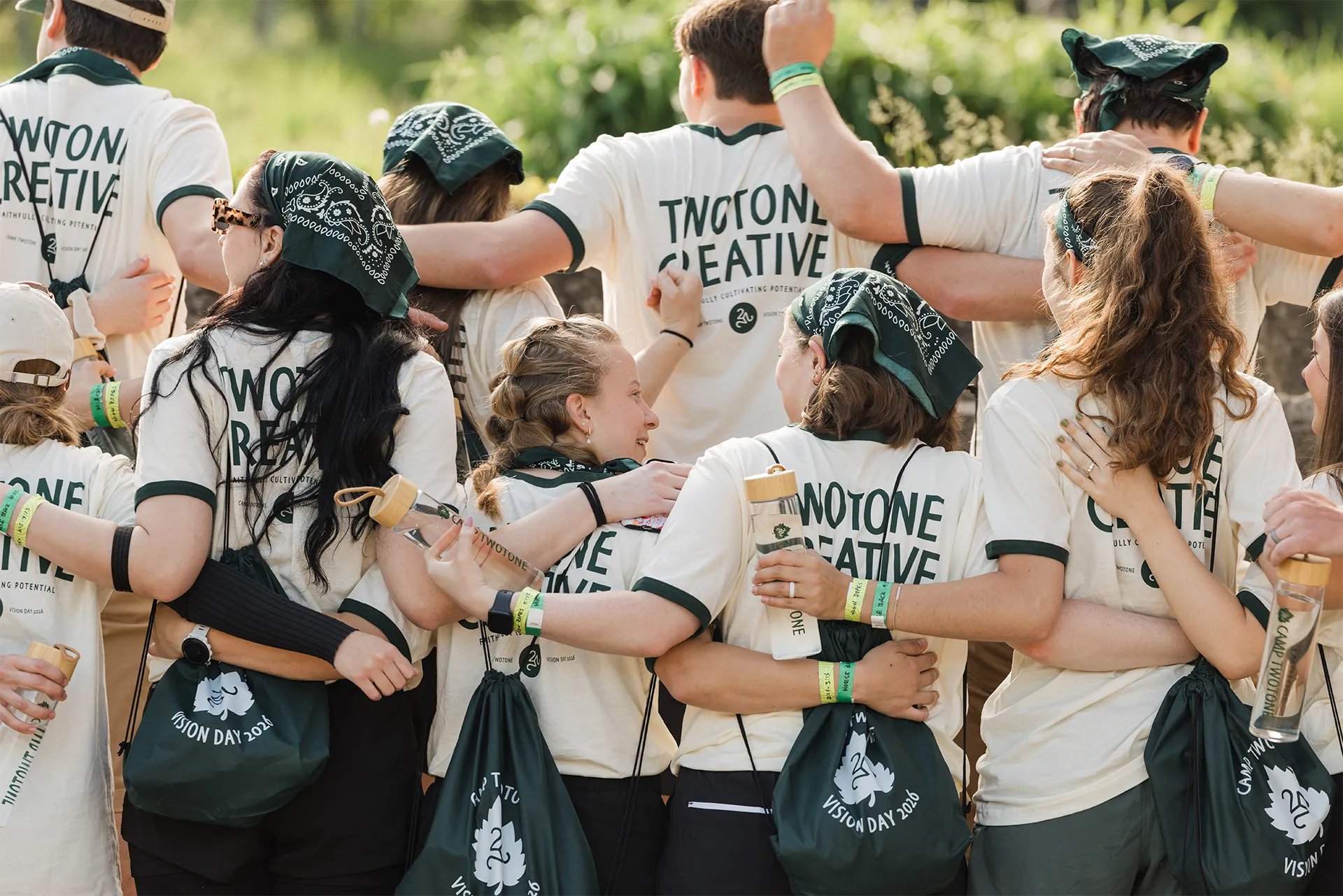 TwoTone Creative team celebrating Vision Day 2026 with camaraderie and company swag.